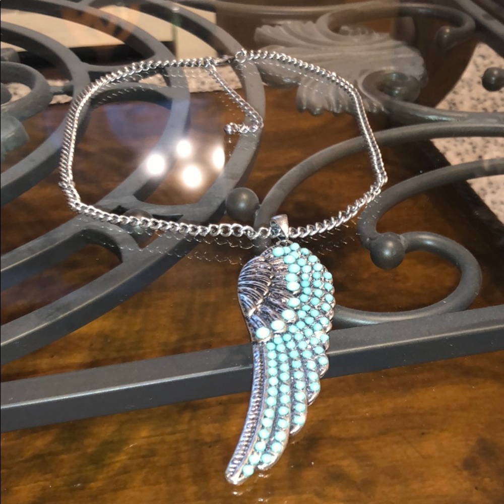 Necklace with angel wing medallion